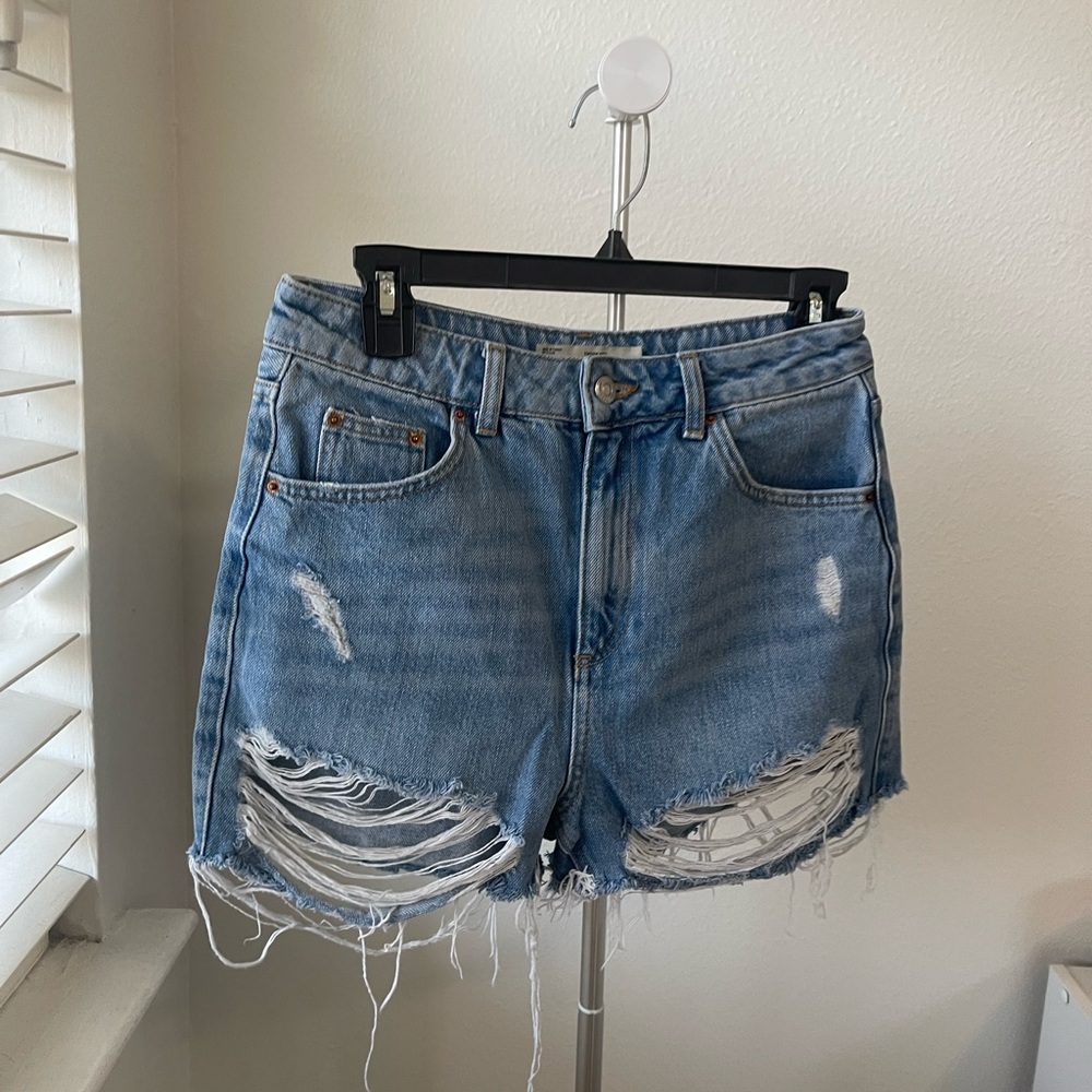 Distressed denim shorts